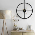 Horloge murale minimaliste noire 52cm design épuré moderne
